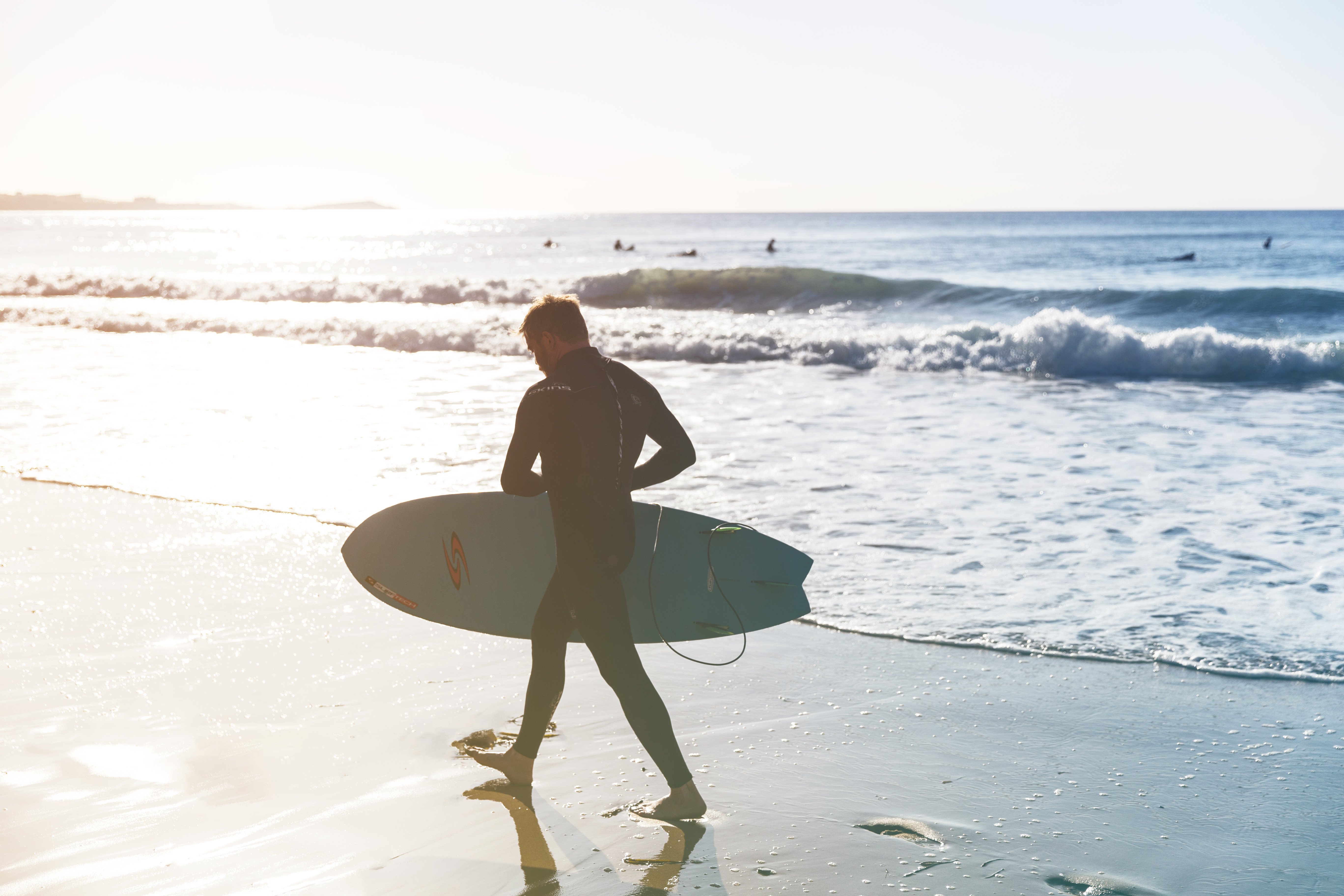 surfer-beach-walk.jpg